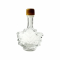 Maple Leaf Syrup Bottles with Tamper-Evident Plastic Lids [1.7 fl oz, 50 ml, Clear Glass, Gold Plastic Lids, Case of 12]